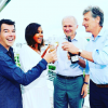Karine Le Marchand, Stéphane Plaza, Nicolas de Tavernos (président du directoire d'M6 ) et Thomas Valentin (vice-président du groupe) sabrent le champagne. Juillet 2017.