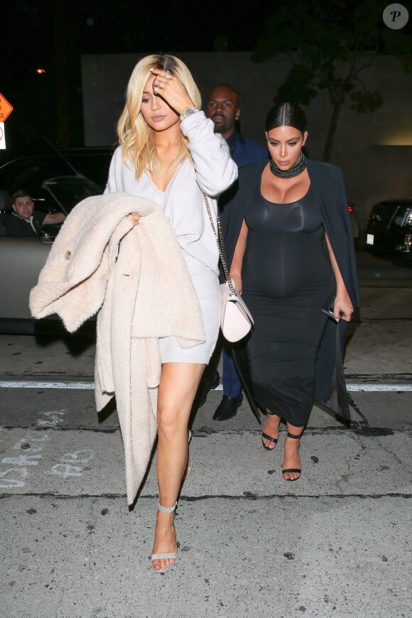 Kim Kardashian, her half sister Kylie Jenner and Kris Jenner's boyfriend Corey Gamble arrive for dinner at Craig's Restaurant following Cosmopolitan Magazine's 50th Birthday celebration at Ysabel. The pregnant reality star's baby bump was on a full display in a skin tight black dress matching with black strappy heels and necklace. Los Angeles, CA, USA, on october 12, 2015. Photo by GSI/ABACAPRESS.COM13/10/2015 - Los Angeles
