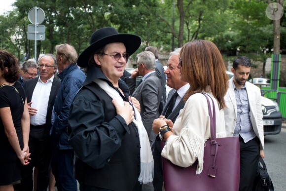 Yves Thréard, Marc Veyrat et Georges Blanc lors de la cérémonie religieuse pour les obsèques de Christian Millau en la basilique Notre-Dame du Perpétuel Secours à Paris le 16 août 2017.