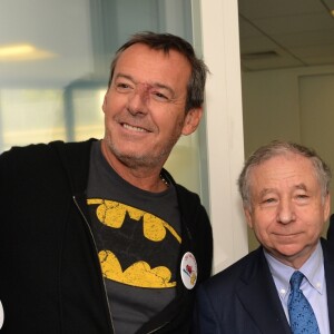 Romain Grosjean, Jean-Luc Reichmann et Jean Todt lors de la 13ème édition du Charity Day dans la salle des marchés d'Aurel BGC dans le quartier de la Bourse à Paris le 11 septembre 2017. © Veeren / Bestimage