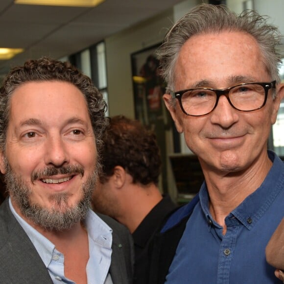 Guillaume Gallienne et Thierry Lhermitte lors de la 13ème édition du Charity Day dans la salle des marchés d'Aurel BGC dans le quartier de la Bourse à Paris le 11 septembre 2017. © Veeren / Bestimage