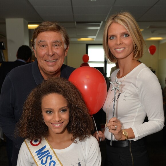 Alicia Aylies (Miss France 2017), Jean-Pierre Foucault et Sylvie Tellier lors de la 13ème édition du Charity Day dans la salle des marchés d'Aurel BGC dans le quartier de la Bourse à Paris le 11 septembre 2017. © Veeren / Bestimage