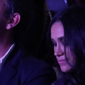 Meghan Markle à la cérémonie d'ouverture des 3e Invictus Games fondés par le prince Harry, à Toronto, en compagnie de son ami Markus Anderson. Son boyfriend le prince Harry était installé dix-huit rangs devant elle, au côté de Melania Trump et derrière Justin Trudeau. Le 23 septembre 2017