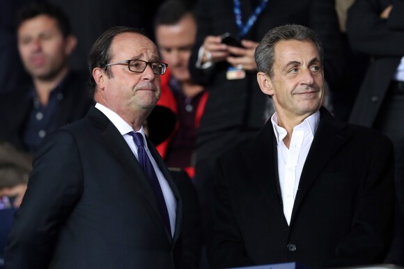 François Hollande et Nicolas Sarkozy assistent au match de le Ligue des Champios PSG/Bayern Munich (3-0) au Parc des Princes à Paris, le 27 septembre 2017. © Cyril Moreau/Bestimage