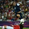 USA's Alex Morgan (13) jumps over Japan's Saki Kumagai (4) in the second half of the women's soccer final at Wembley Stadium in London, UK, in the Summer Olympic Games on Thursday, August 9, 2012. The U.S. defeated Japan, 2-1, for the gold medal. Photo by Nhat V. Meyer/San Jose Mercury News/MCT/ABACAPRESS.COM10/08/2012 - London