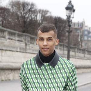 Stromae au défilé prêt-à-porter automne-hiver 2015, 2016 Valentino dans les jardins des Tuileries à Paris. Le Mardi 10 Mars 2015.