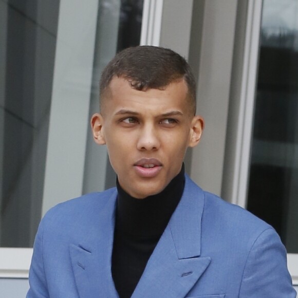 Stromae - People à la sortie du défilé de mode "Louis Vuitton", collection prêt-à-porter automne-hiver 2015/2016, à Paris.