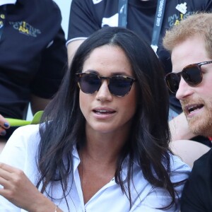 Première apparition officielle du prince Harry et sa compagne Meghan Markle dans les tribunes de la finale de tennis à la troisième édition des Invictus Games à Toronto, Ontario, le 25 septembre 2017.
