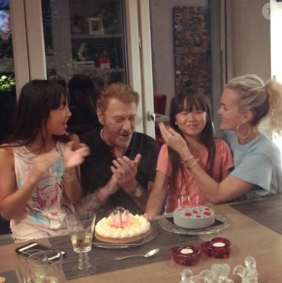 Laeticia et Johnny Hallyday avec leurs filles Jade et Joy pour l'anniversaire de Joy le 27 juillet 2017 à Paris.
