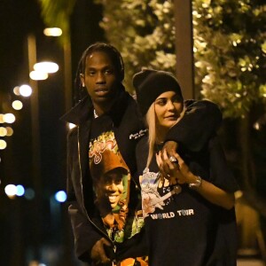 Exclusive - Kylie Jenner and Her new boyfriend Travis Scott show some PDA as they take a walk through a park together before he takes the stage to perform live at the Rolling Loud festival in Miami, Florida. The reality star and the rapper walked with their arms around each other, and their fingers intertwined, as they enjoyed a moment of calm before addressing the massive crowd at the festival, Miami, FL, USa on May 7, 2017. Photo by INSTARimages/ABACAPRESS.COM10/05/2017 - Miamik