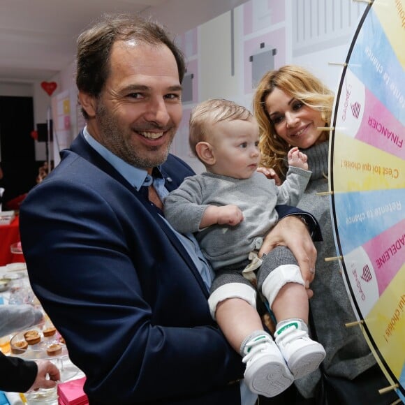 Exclusif - Ingrid Chauvin avec son mari Thierry Peythieu et leur fils Tom - Élection du Bébé Cadum 2017 lors de la "Rigoladerie Cadum, la family party engagée" en présence des marraines et de l'association "Coeur a Coeur" à Paris le 4 février 2017. © Philippe Doignon / Bestimage