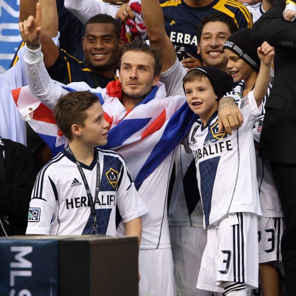 David Beckham (Los Angeles Galaxy) et ses fils Brooklyn, Cruz et Romeo à Carson, le 1er décembre 2012.