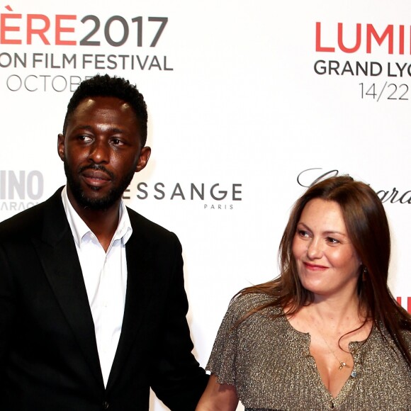 Thomas Ngijol et sa compagne Karole Rocher, enceinte - Tapis rouge de la cérémonie d'ouverture du Festival Lumière 2017, Lyon, le 14 Octobre 2017 © Dominique Jacovides/Bestimage