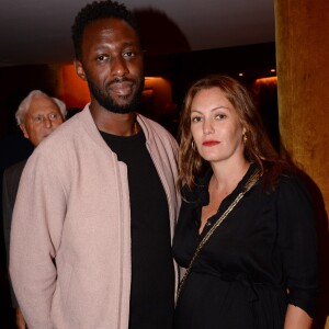 Thomas N'Gijol et sa compagne Karole Rocher enceinte de son 4ème enfant - Soirée d'inauguration de l'Hôtel Fouquet's Barrière à Paris le 14 septembre 2017. © Rachid Bellak/Bestimage