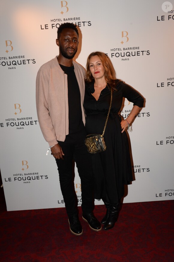 Thomas N'Gijol et sa compagne Karole Rocher enceinte de son 4ème enfant - Soirée d'inauguration de l'Hôtel Fouquet's Barrière à Paris le 14 septembre 2017.  © Rachid Bellak/Bestimage