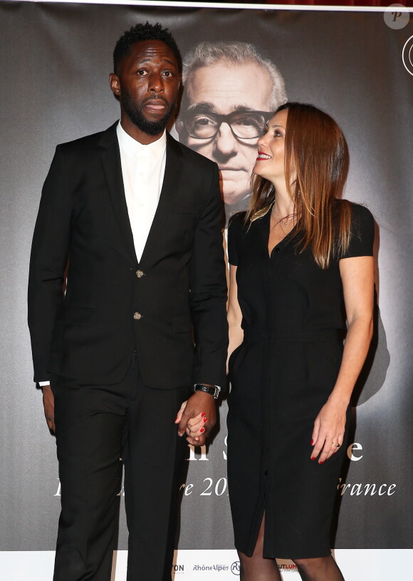 Thomas Ngijol et sa compagne Karole Rocher - Photocall de la cérémonie de remise du prix Lumière à Martin Scorsese lors du festival Lumière 2015 (Grand Lyon Film Festival) à Lyon. Le 16 octobre 2015.