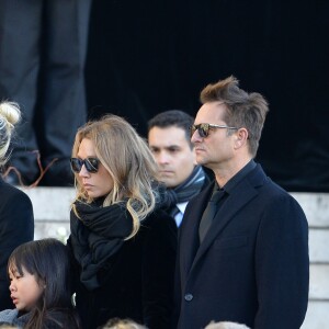 La Première Dame Brigitte Macron (Trogneux), David Hallyday, Laura Smet, Laeticia Hallyday, ses filles Jade et Joy devant l'église de la Madeleine pour les obsèques de Johnny Hallyday à Paris, France, le 9 décembre 2017. © Veeren/Bestimage