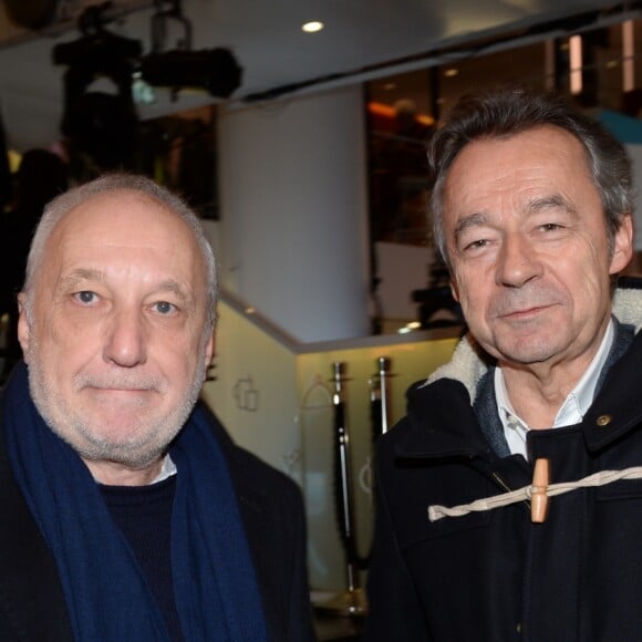 François Berléand et Michel Denisot - Présentation de la Renault Zoé Série Limitée Star Wars directement liée à l'univers du futur film Star Wars: Han Solo, qui sortira au printemps 2018, à l'atelier Renault sur les Champs Elysées à Paris, France, le 13 décembre 2017. La Zoé Star Wars sera Commercialisée au printemps prochain, et disponible uniquement en 1000 exemplaires. Renault partenaire de la saga STAR WARS™. © Rachid Bellak/Bestimage