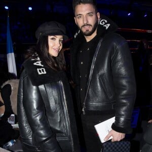 Nabilla Benattia et son compagnon Thomas Vergara, portent le même manteau Balenciaga - Soirée boxe No Limit - Episode II dans l'enceinte du Palais des Sports de Levallois-Perret, France, le 14 décembre 2017. © Cyril Moreau/Bestimage