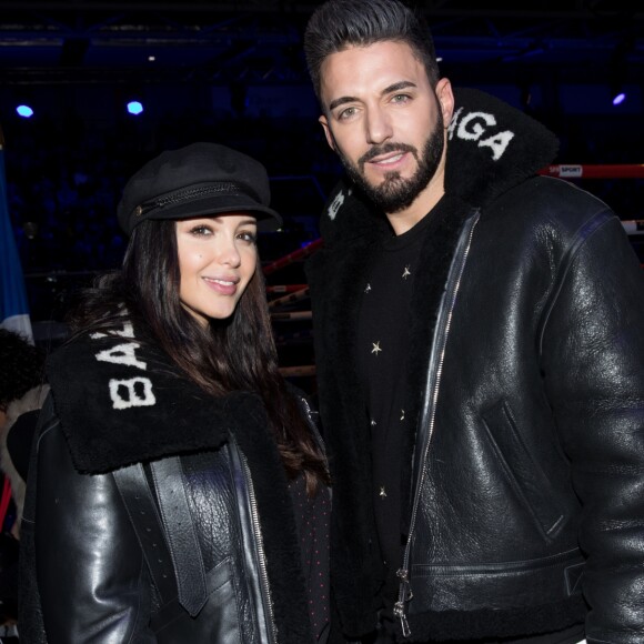 Nabilla Benattia et son compagnon Thomas Vergara, portent le même manteau Balenciaga - Soirée boxe No Limit - Episode II dans l'enceinte du Palais des Sports de Levallois-Perret, France, le 14 décembre 2017. © Cyril Moreau/Bestimage