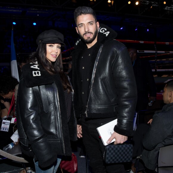 Nabilla Benattia et son compagnon Thomas Vergara, portent le même manteau Balenciaga - Soirée boxe No Limit - Episode II dans l'enceinte du Palais des Sports de Levallois-Perret, France, le 14 décembre 2017. © Cyril Moreau/Bestimage