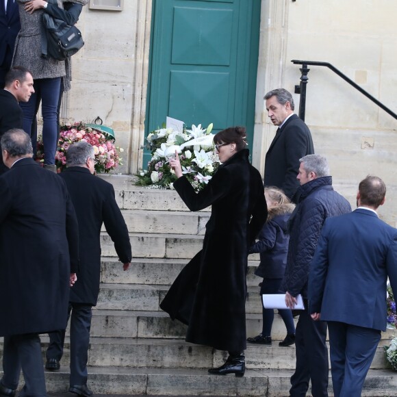 Carla Bruni et Nicolas Sarkozy avec leur fille Giulia - Obsèques de Andrée Sarkozy (mère de N.Sarkozy), dite Dadue née Andrée Mallah, en l'église Saint-Jean-Baptiste à Neuilly-Sur-Seine. Le 18 décembre 2017 