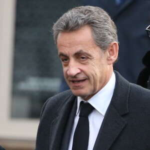 Nicolas Sarkozy et sa femme Carla Bruni-Sarkozy - Obsèques de Andrée Sarkozy (mère de N.Sarkozy), dite Dadue née Andrée Mallah, en l'église Saint-Jean-Baptiste à Neuilly-Sur-Seine, le 18 décembre 2017.