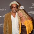 Exclusif - Yannick Noah et Isabelle Camus lors du dîner de la fondation ARC au restaurant de l'hôtel The Peninsula à Paris le 10 octobre 2016. © Rachid Bellak / Bestimage