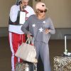 Mel B et son compagnon Gary Madatyan arrivent à l'aéroport de Los Angeles en provenance de Las Vegas, le 14 décembre 2017
