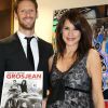 Romain Grosjean et son épouse Marion Jollès-Grosjean (enceinte) posent pour la promotion de leur livre de recettes de cuisine "Cuisine et Confidences", disponible en anglais.