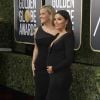 Reese Witherspoon, Eva Longoria enceinte, lors des Golden Globes Awards à Beverly Hills, Los Angeles, le 7 janvier 2018.