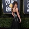 Dakota Johnson, habillée d'une robe Gucci (pré-collection automne 2018) accessoirisée de bijoux Nirav Modi - 75e cérémonie des Golden Globes à l'hôtel Beverly Hilton. Beverly Hills, le 7 janvier 2018.