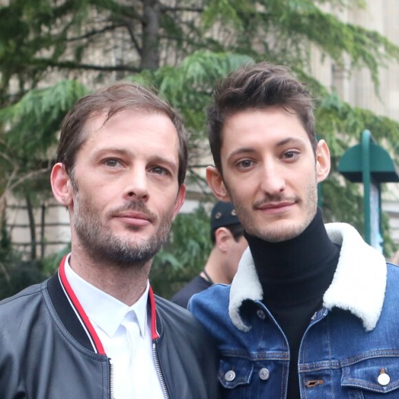 Nicolas Duvauchelle et Pierre Niney - Défilé de mode Dior Homme collection Automne/Hiver 2018/2019 à Paris, le 20 janvier 2018. © CVS / Veeren / Bestimage