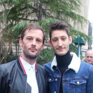 Nicolas Duvauchelle et Pierre Niney - Défilé de mode Dior Homme collection Automne/Hiver 2018/2019 à Paris, le 20 janvier 2018. © CVS / Veeren / Bestimage