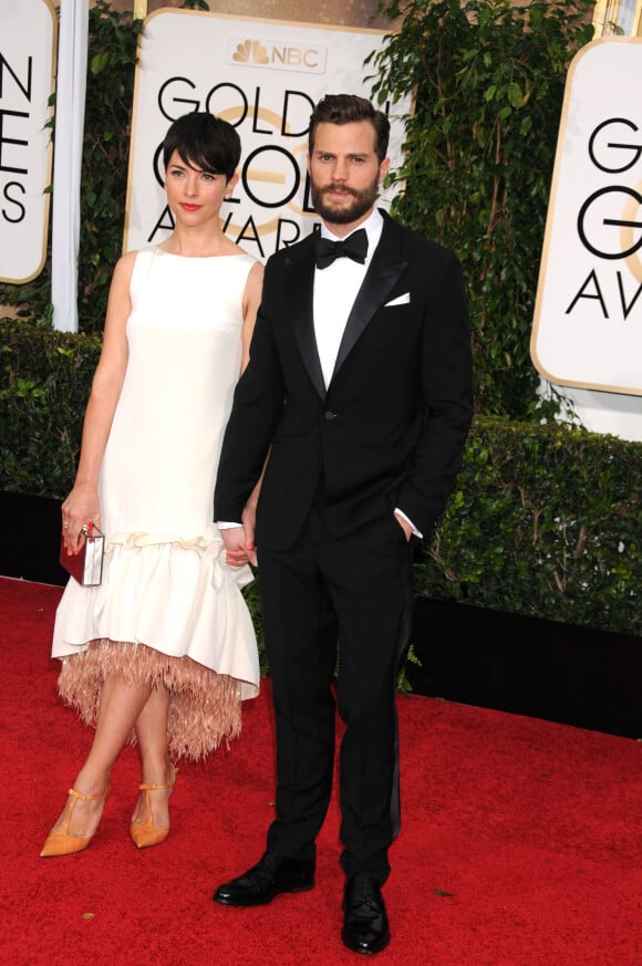 Jamie Dornan et Amelia Warner - 72e cérémonie annuelle des Golden Globe Awards à Beverly Hills. Le 11 janvier 2015