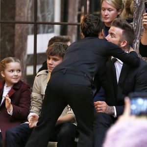 Victoria Beckham embrasse son mari David et leurs enfants à l'ssue du défilé Victoria Beckham, collection prêt-à-porter Automne-Hiver 2018. New York, le 11 février 2018.