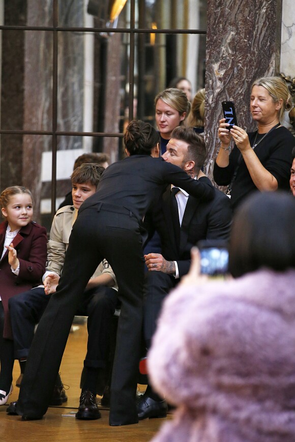 Victoria Beckham embrasse son mari David et leurs enfants à l'ssue du défilé Victoria Beckham, collection prêt-à-porter Automne-Hiver 2018. New York, le 11 février 2018.