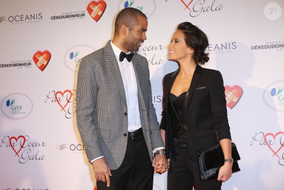 Tony Parker et sa femme Axelle au gala "Par Coeur" pour les 10 ans de l'association "Cekedubonheur" au pavillon d'Armenonville à Paris le 24 septembre 2015