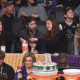 Julianne Moore, son mari Bart Freundlich et sa fille Liv assistent au NBA All-Star Game 2018 au Staples Center. Los Angeles, le 18 février 2018.