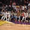 DJ Khaled et sa fiancée Nicole Tuck, Ludacris et son épouse Eudoxie Bridges, Queen Latifah, Snoop Dogg et son épouse Shante Braodus et Chance The Rapper assistent au NBA All-Star Game 2018 au Staples Center. Los Angeles, le 18 février 2018.