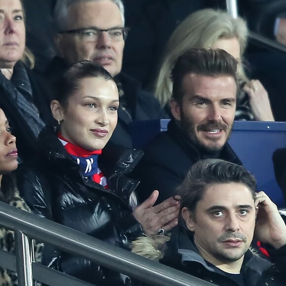 Bella Hadid et David Beckham - People lors du huitième de finale retour de Ligue des Champion, du Paris Saint-Germain contre le Real Madrid au Parc des Princes à Paris le 6 mars 2018. Le Real à remporté le match sur le score de 2 buts à 1. © Cyril Moreau/Bestimage