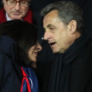 Nicolas Sarkozy et la maire de Paris Anne Hidalgo - People lors du huitième de finale retour de Ligue des Champion, du Paris Saint-Germain contre le Real Madrid au Parc des Princes à Paris le 6 mars 2018. Le Real à remporté le match sur le score de 2 buts à 1. © Cyril Moreau/Bestimage