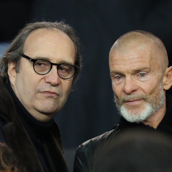 Xavier Niel et Nevo Aviv - People lors du huitième de finale retour de Ligue des Champion, du Paris Saint-Germain contre le Real Madrid au Parc des Princes à Paris le 6 mars 2018. Le Real à remporté le match sur le score de 2 buts à 1. © Cyril Moreau/Bestimage