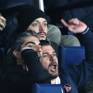 Kev Adams, Ary Abittan, Michaël Youn - People lors du huitième de finale retour de Ligue des Champion, du Paris Saint-Germain contre le Real Madrid au Parc des Princes à Paris le 6 mars 2018. Le Real à remporté le match sur le score de 2 buts à 1. © Cyril Moreau/Bestimage