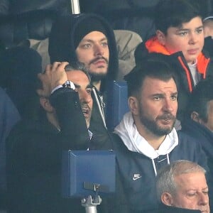 Ary Abittan, Kev Adams, Michaël Youn - People lors du huitième de finale retour de Ligue des Champion, du Paris Saint-Germain contre le Real Madrid au Parc des Princes à Paris le 6 mars 2018. Le Real à remporté le match sur le score de 2 buts à 1. © Cyril Moreau/Bestimage