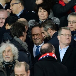 François Hollande, Jean-Claude Blanc, Louis Bertignac - People lors du huitième de finale retour de Ligue des Champion, du Paris Saint-Germain contre le Real Madrid au Parc des Princes à Paris le 6 mars 2018. Le Real à remporté le match sur le score de 2 buts à 1. © Rachid Bellak/Bestimage