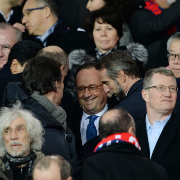 François Hollande, Jean-Claude Blanc, Louis Bertignac - People lors du huitième de finale retour de Ligue des Champion, du Paris Saint-Germain contre le Real Madrid au Parc des Princes à Paris le 6 mars 2018. Le Real à remporté le match sur le score de 2 buts à 1. © Rachid Bellak/Bestimage