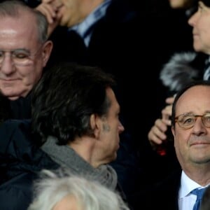 François Hollande, Jean-Claude Blanc, Louis Bertignac - People lors du huitième de finale retour de Ligue des Champion, du Paris Saint-Germain contre le Real Madrid au Parc des Princes à Paris le 6 mars 2018. Le Real à remporté le match sur le score de 2 buts à 1. © Rachid Bellak/Bestimage