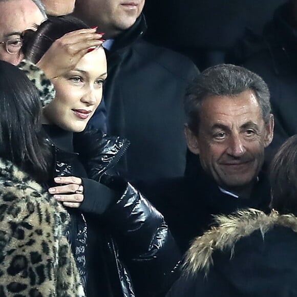 Bella Hadid et Nicolas Sarkozy - People lors du huitième de finale retour de Ligue des Champion, du Paris Saint-Germain contre le Real Madrid au Parc des Princes à Paris le 6 mars 2018. Le Real à remporté le match sur le score de 2 buts à 1. © Cyril Moreau/Bestimage 