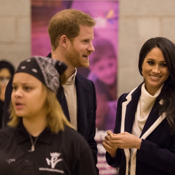 Le prince Harry et sa fiancée Meghan Markle assistent à une séance de formation des apprentis coaches au Nechells Wellbeing Centre à Birmingham le 8 mars 2018.